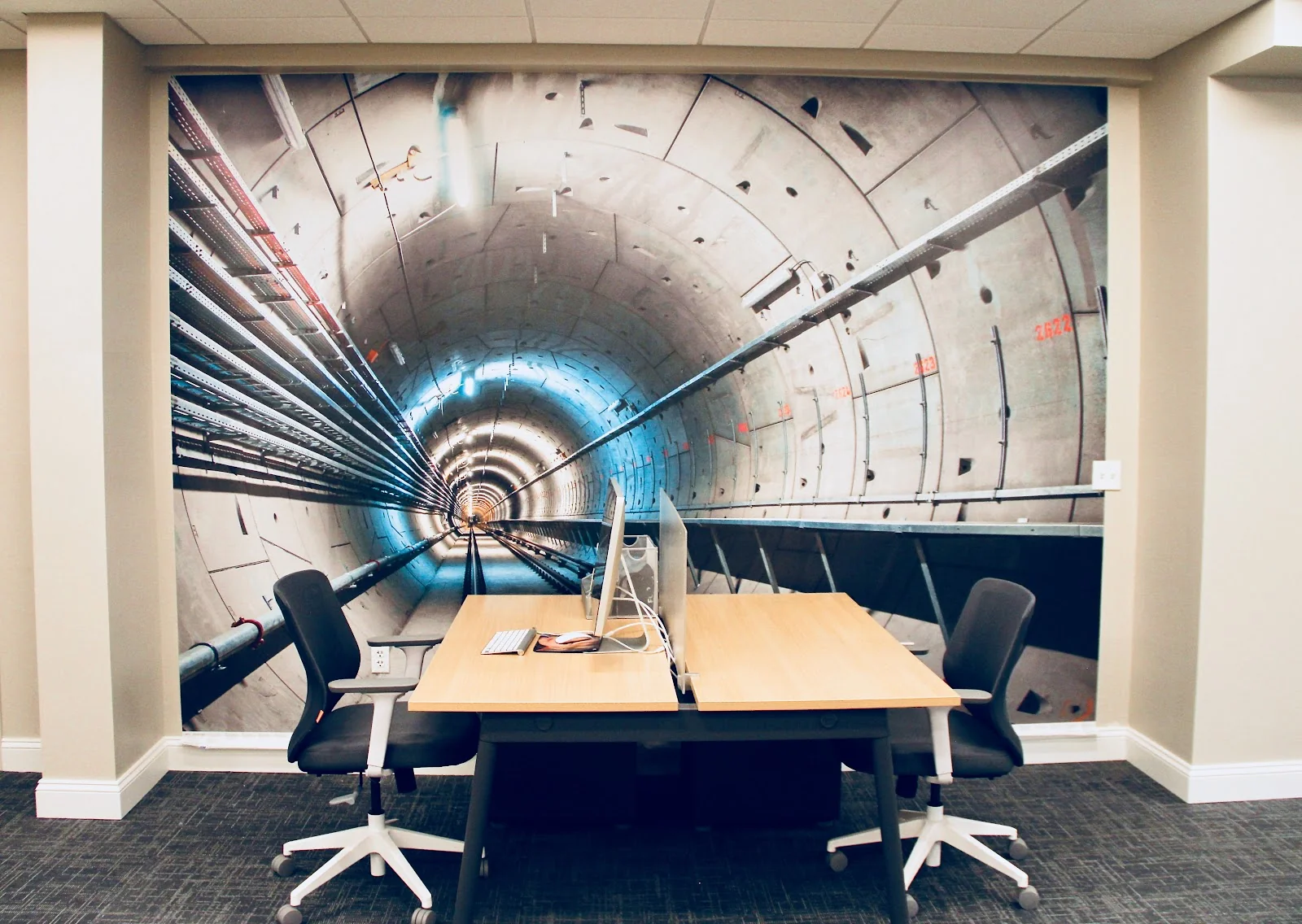The Westport Hub - creative office with dramatic subway tunnel mural wallpaper