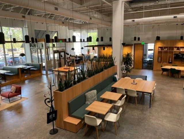 Spaces Blue Back Square West Hartford - modern open coworking with booth seating and pendant lights