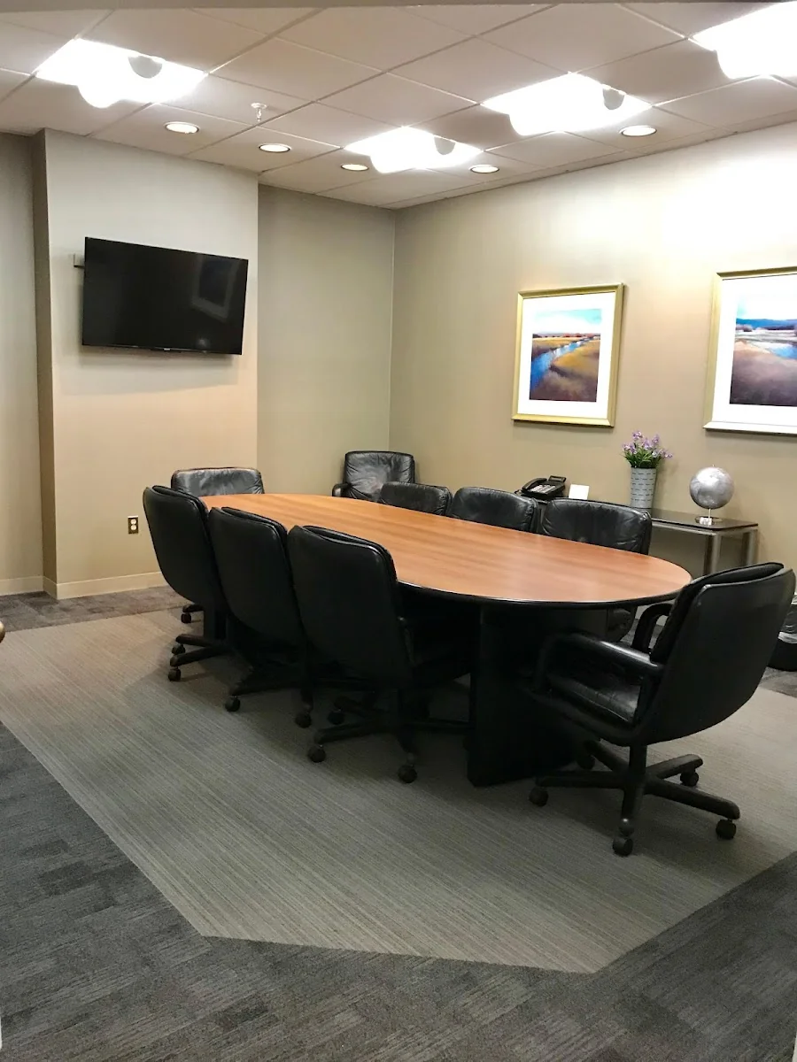 191 WORKS Westport - executive conference room with oval cherry table and marsh landscape artwork
