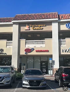 CCLG Workspace Center strip mall storefront exterior with Workspace Center signage and Spanish tile roof