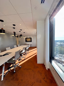 Pipeline Orlando high-floor conference room with long table, floor-to-ceiling windows, and city views