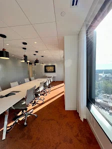 Pipeline Orlando high-floor conference room with long table, floor-to-ceiling windows, and city views